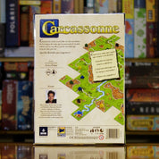 Trasera del juego de mesa 'Carcassonne' disponible en Mana House – Componentes, Reglas, Meeples, Construcción de Territorio, Actualización de Diseño.