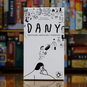 Portada del juego Dany disponible en Mana House – Juego social, Deducción, Creatividad, Identidades ocultas, Estilo ilustrado surrealista.