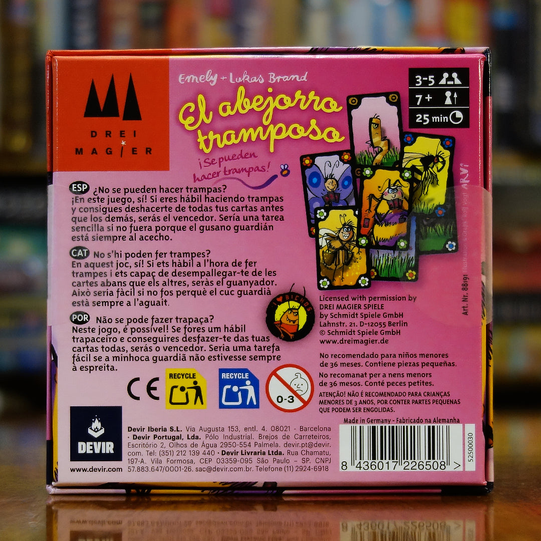 Trasera del juego El Abejorro Tramposo disponible en Mana House – Mecánica de hacer trampa permitida, Cartas vigiladas por el Gusano Vigilante, Competencia por descartar cartas, Juego rápido e interactivo, Estilo cómico y ligero. Schummel Hummel