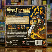 Trasera del juego de mesa 'El Rey de la Montaña' disponible en Mana House - Componentes, Reglas, Excavación, Estatuas, Túneles.