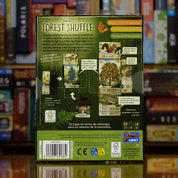 Trasera del juego 'Forest Shuffle' disponible en Mana House – Animales y plantas con diferentes requisitos, Creación de ecosistema equilibrado, Mecánica de combinación de cartas, Puntuación por sinergias, De 2 a 5 jugadores.