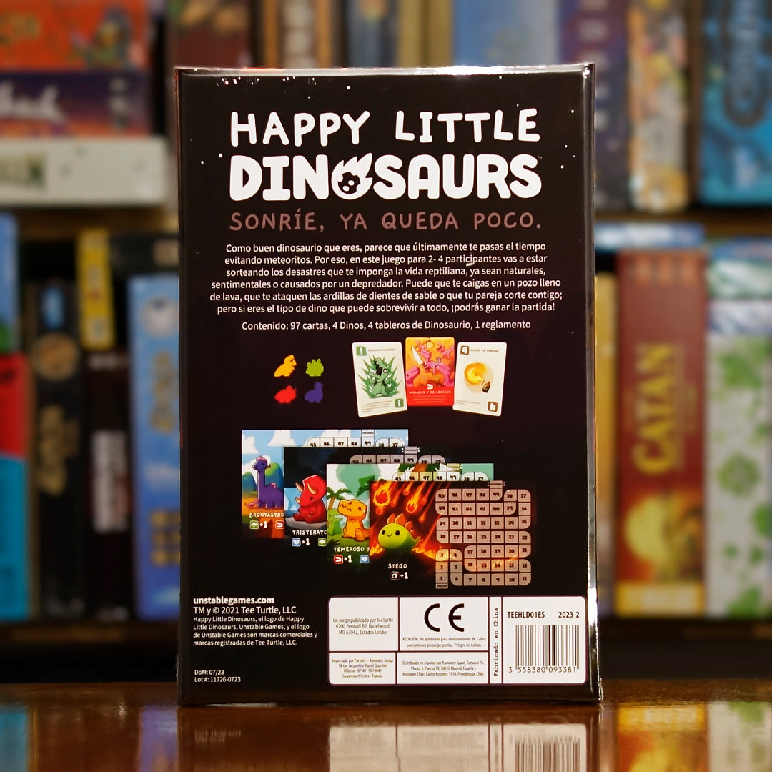 Vista trasera del juego de mesa 'Happy Little Dinosaurs' con detalles y componentes, en Mana House - Humor. Animales, Cartas, Dinosaurios, Humor, Prehistoria.