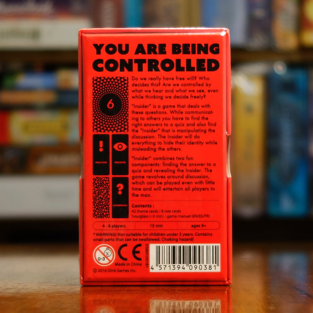 Vista trasera del juego de mesa 'Insider' con detalles y componentes, en Mana House - Misterio. Bluffing, Deducción, Misterio.