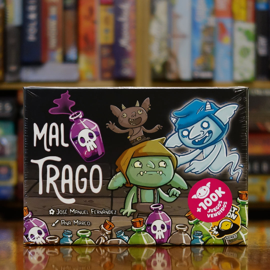 Portada del juego Mal Trago disponible en Mana House – Party game, Humor goblin, Pociones mágicas, Risas aseguradas, Ilustraciones divertidas.