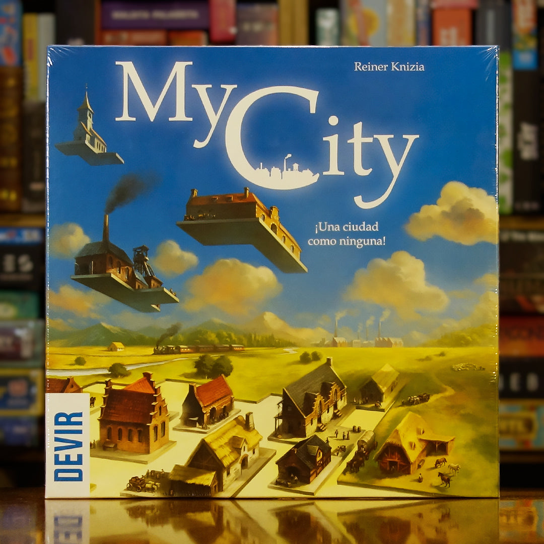 Portada del juego 'My City' disponible en Mana House – Juego legacy, Construcción de ciudades, Evolución por episodios, Colocación de piezas tipo Tetris, De Reiner Knizia.