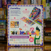 Trasera del juego de mesa 'Paradice' disponible en Mana House - Componentes, Reglas, Máquina Dispensadora, Bonus, Tickets.