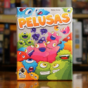 Portada del juego de mesa 'Pelusas' disponible en Mana House - Cartas. Cartas.
