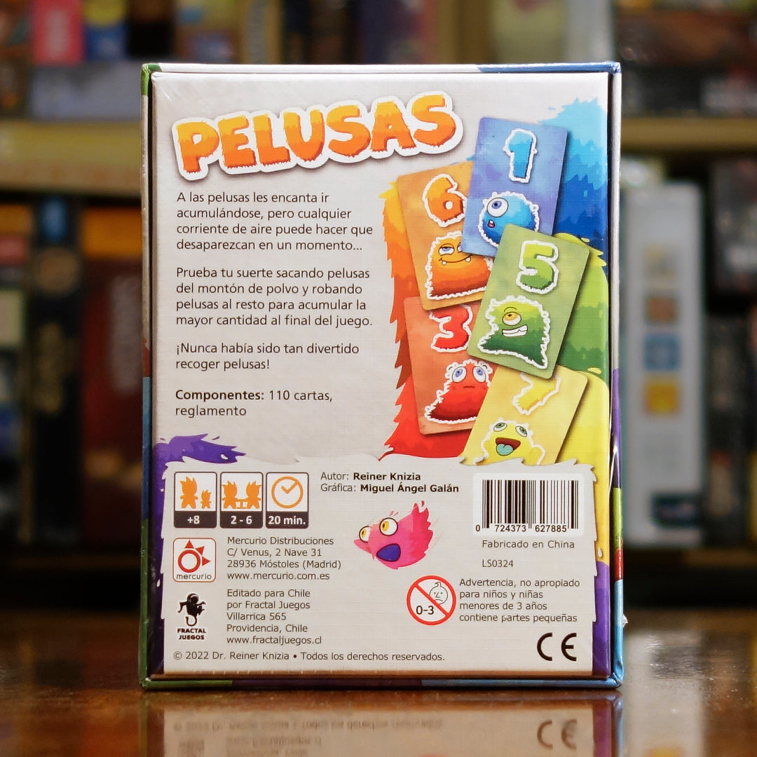 Vista trasera del juego de mesa 'Pelusas' con detalles y componentes, en Mana House - Cartas. Cartas.