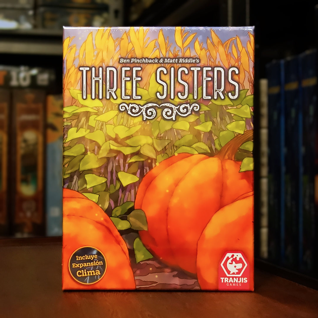 Portada del juego Three Sisters disponible en Mana House – Juego roll-and-write estratégico, Agricultura y cultivos, Gestión de jardín, Ilustraciones de Beth Sobel, Combos y bonificaciones.