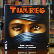 Portada del juego 'Targi' disponible en Mana House – Juego estratégico para 2 jugadores, Comercio en el desierto, Pueblo tuareg, Intercambio de recursos, Estilo minimalista y temático.