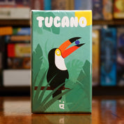 Portada del juego de mesa 'Tucano' disponible en Mana House - Cartas. Animales, Cartas, Comida.