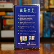 Vista trasera del juego de mesa 'Tucano' con detalles y componentes, en Mana House - Cartas. Animales, Cartas, Comida.