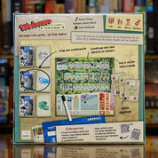 Trasera del juego 'Welcome... Hacia el Perfecto Hogar' disponible en Mana House – Partidas simultáneas, Diseño de vecindarios, Combinación de números y efectos, Planificación urbana, Ideal para grupos.